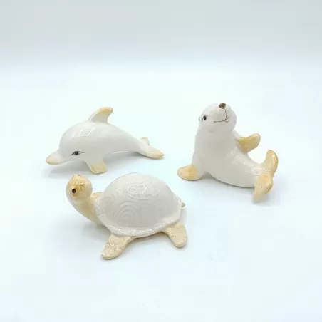 Animali ass .foca ,tartaruga ,delfino porcellana bianca - 1