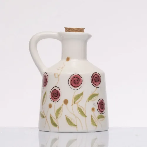 Bomboniera solidale oliera piccola bocciolo rosa Cuorematto 2026 Cuorematto - 1