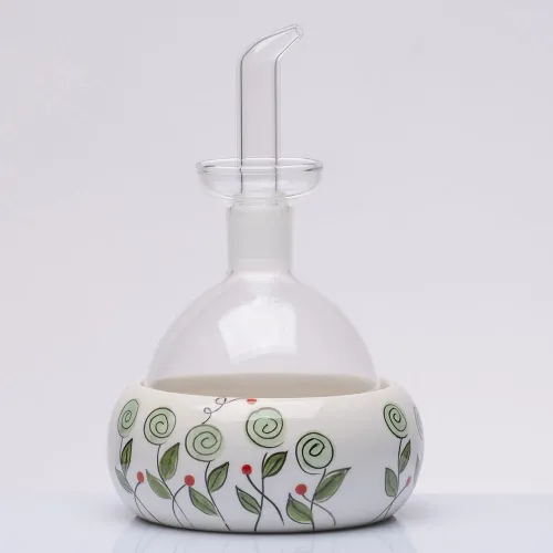 Bomboniera solidale oliera vetro con piattino bocciolo verde Cuorematto 2026 Cuorematto - 1