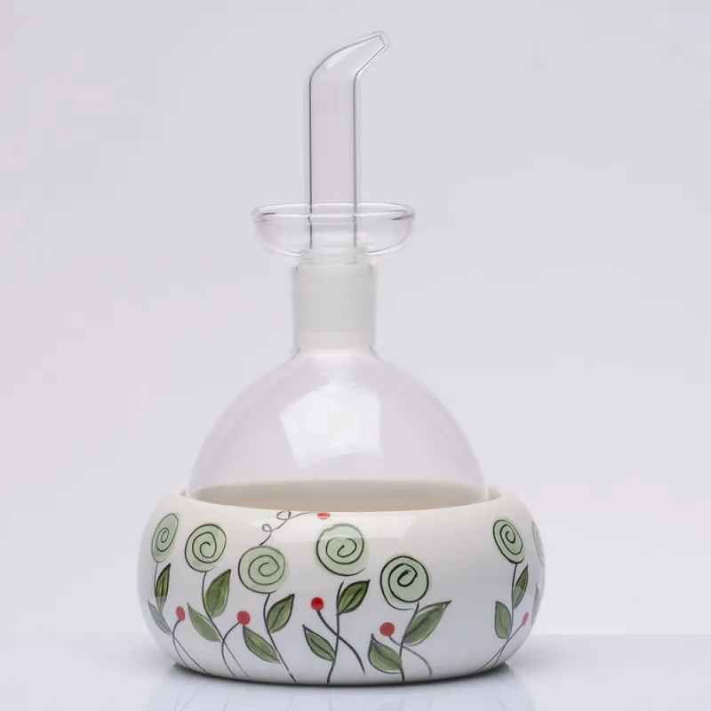 Bomboniera solidale oliera vetro con piattino bocciolo verde Cuorematto 2026 Cuorematto - 1